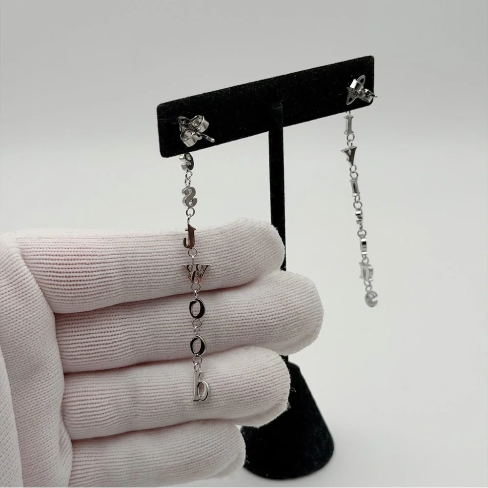 VIVIENNE WESTWOOD RAIMUNDA ASYMMETRICAL LETTER DROP EARRINGS – SILVER TONE - Picture 5 of 6